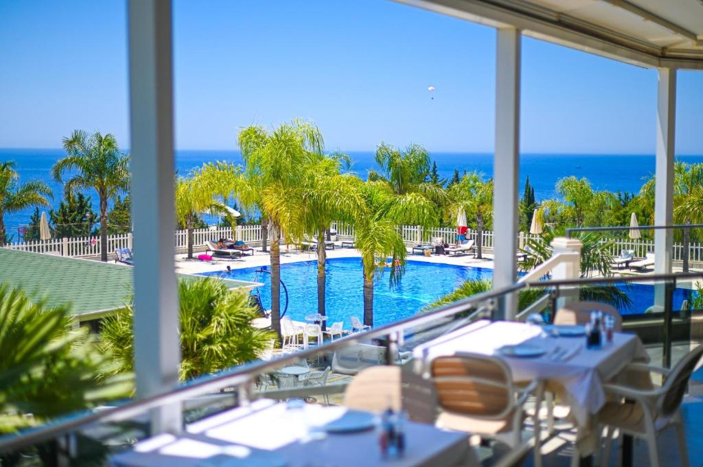 Bazén v ubytování Elysium Hotel nebo v jeho okolí