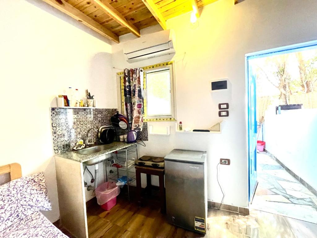 Kuchyň nebo kuchyňský kout v ubytování Nona’s House