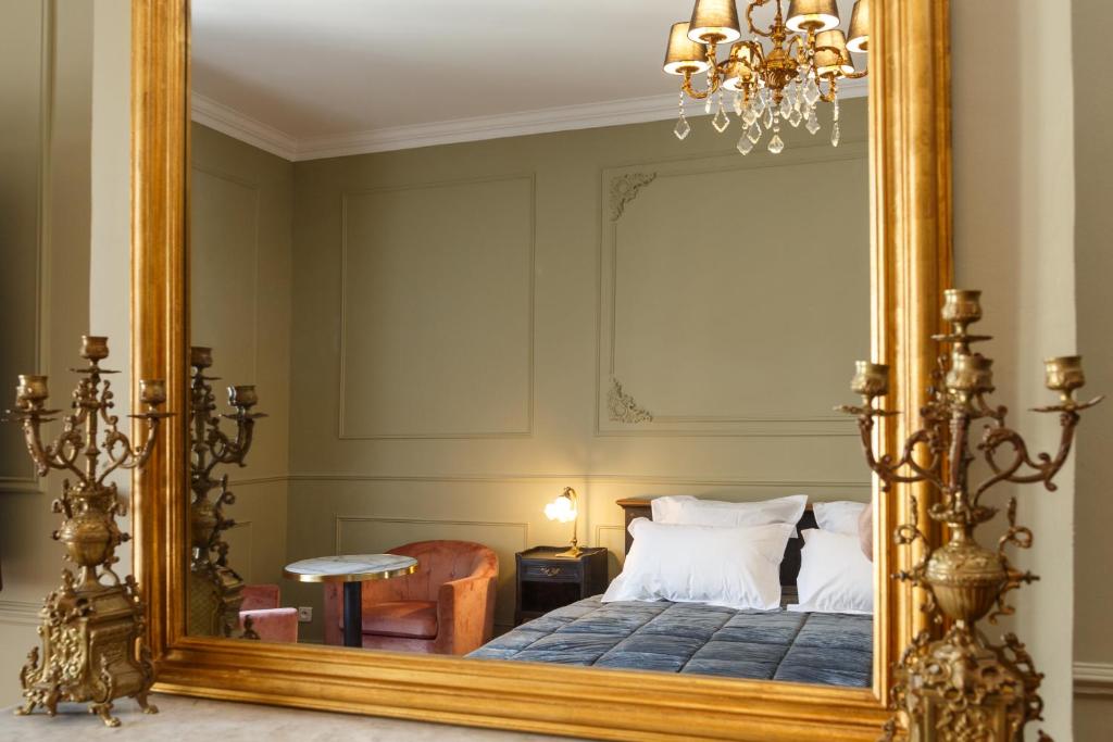 Postel nebo postele na pokoji v ubytování Le 215 Gambetta boutique hôtel en Provence
