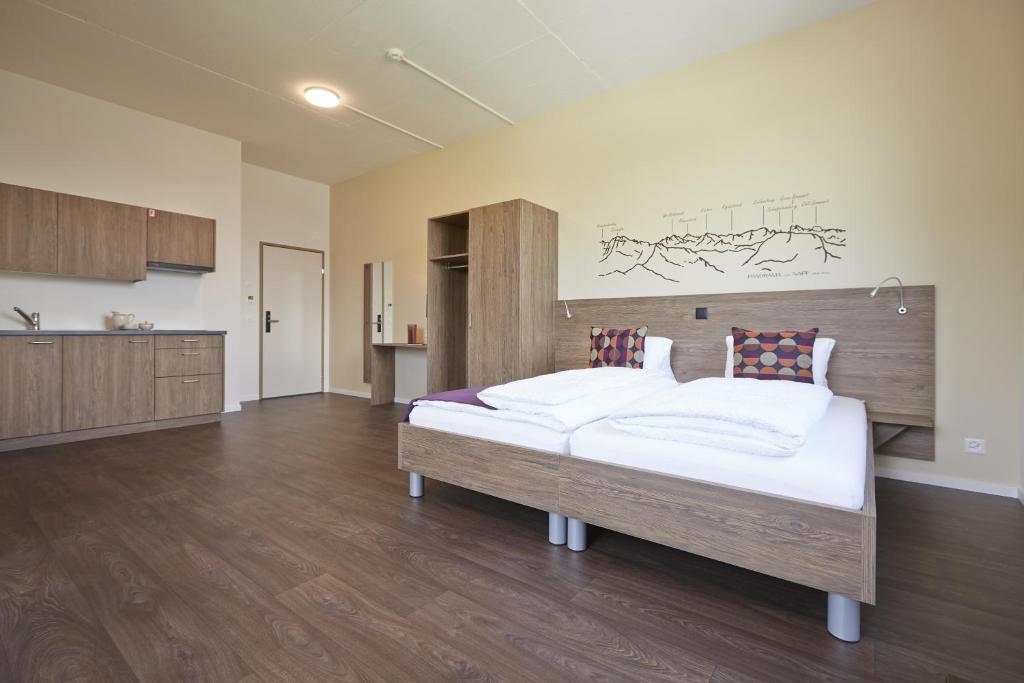 Postel nebo postele na pokoji v ubytování B&B Hotel Peter und Paul