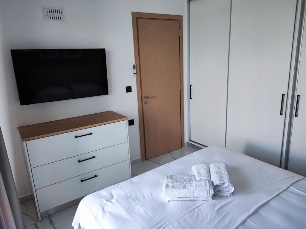 Postel nebo postele na pokoji v ubytování suite apartment Αdonis