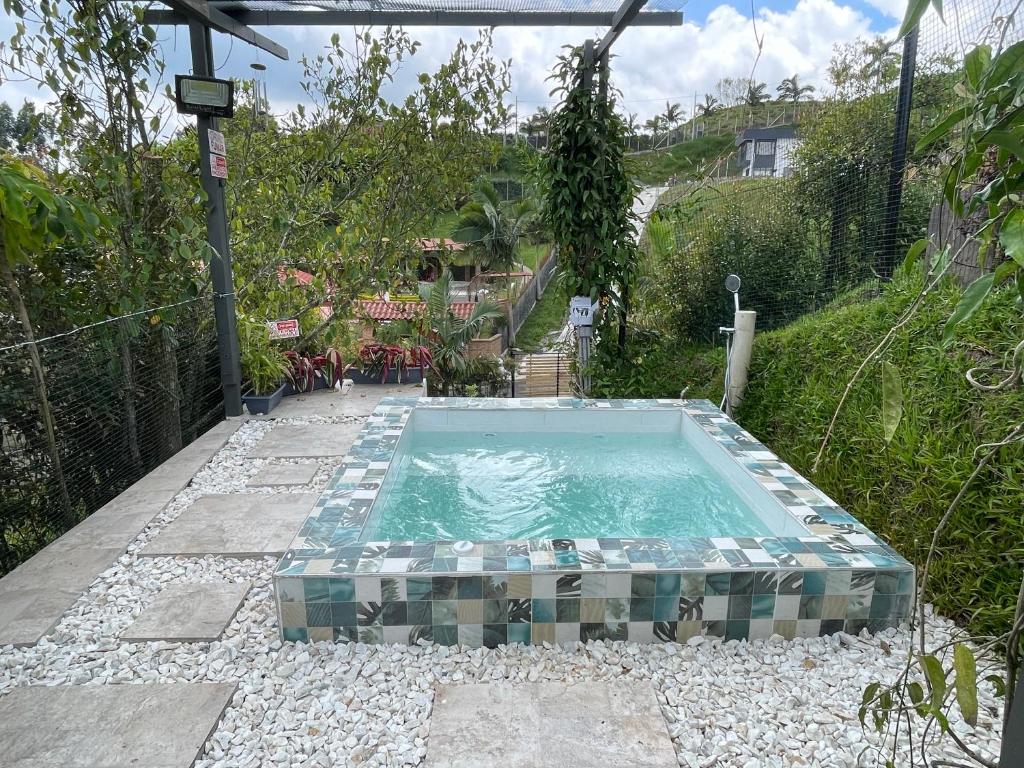 Swimmingpoolen hos eller tæt på Cabaña privada cerca a Salento -Gaia Loft-
