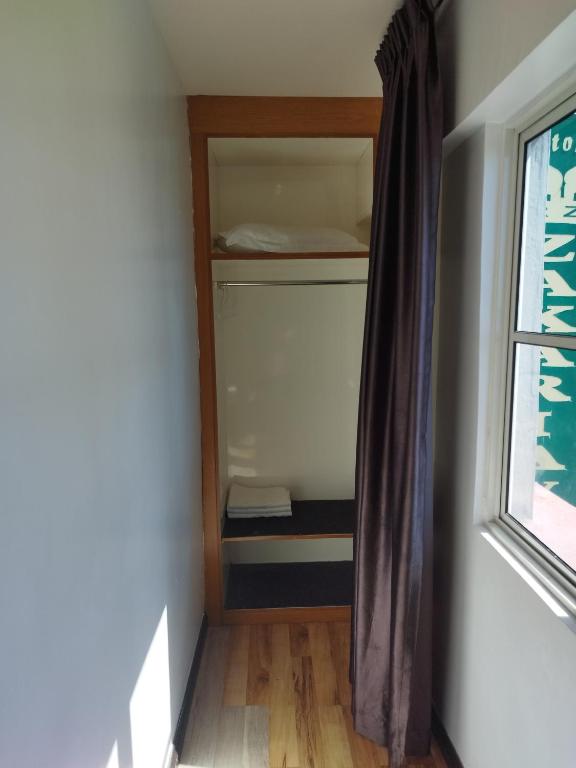 Postel nebo postele na pokoji v ubytování Marine Bay Hotel