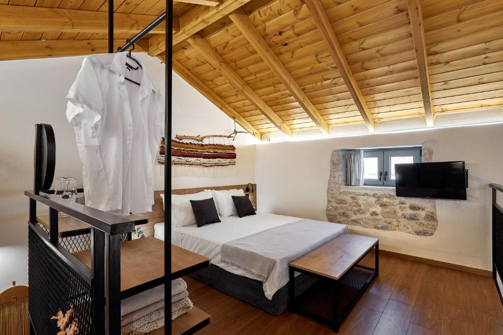 Postel nebo postele na pokoji v ubytování Vin Dimora Suites