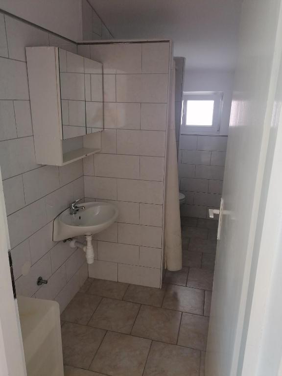 Kúpeľňa v ubytovaní Apartmani Marija i Josip