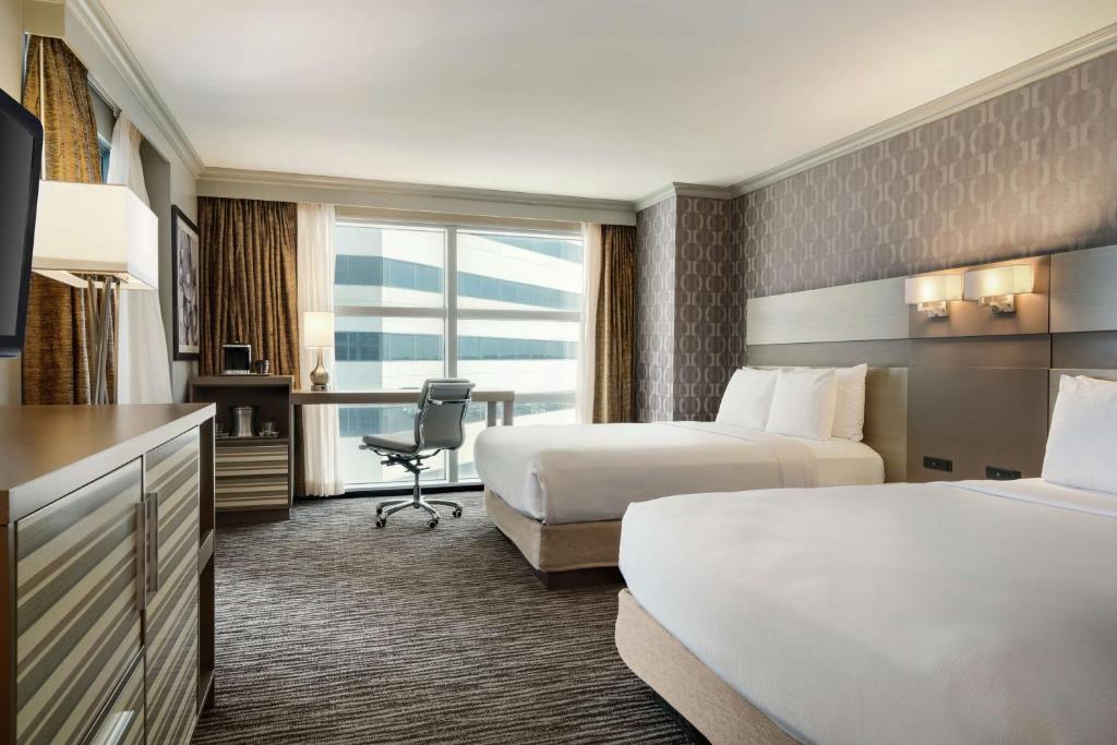 Postel nebo postele na pokoji v ubytování Hilton Melbourne, FL
