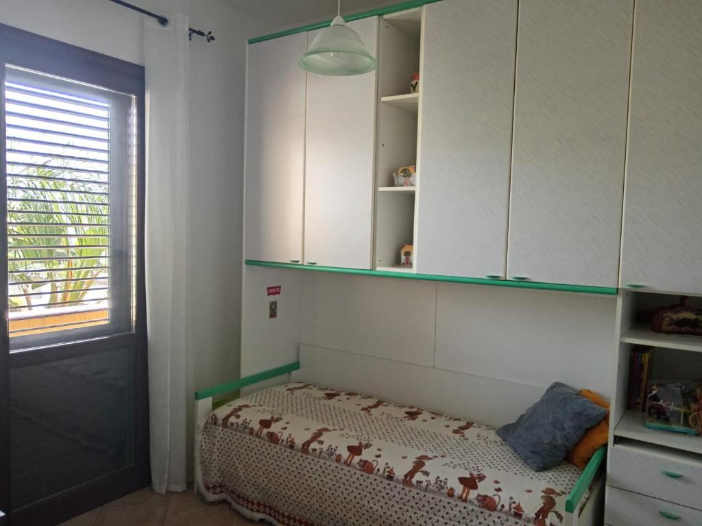 Postel nebo postele na pokoji v ubytování Il Rustico di Pino