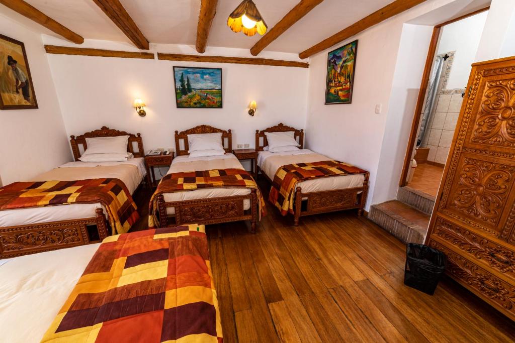 Postel nebo postele na pokoji v ubytování Amaru Inca