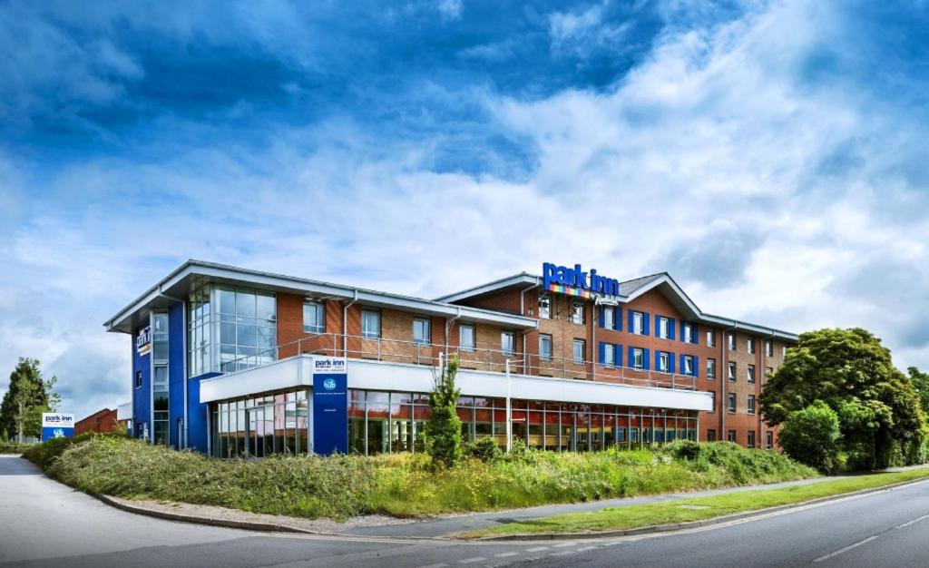 a building on the side of a road at Park Inn by Radisson Birmingham Walsall in Walsall
