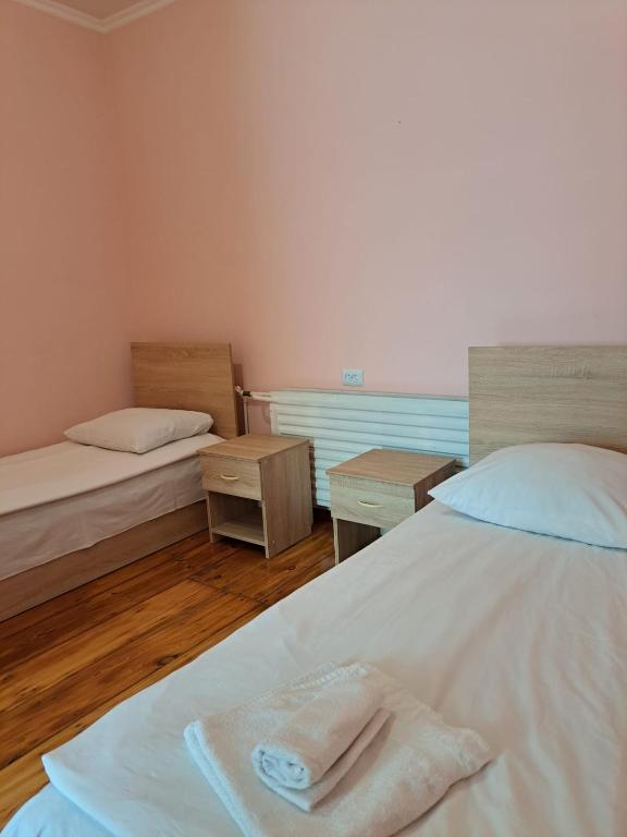 Postel nebo postele na pokoji v ubytování Guest House David's B&B
