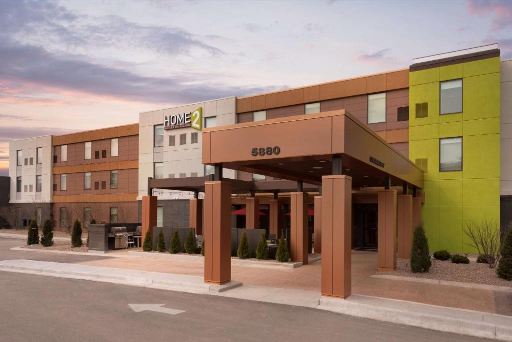 a rendering of the front of a hotel at Home2 Suites by Hilton Milwaukee Airport in Milwaukee
