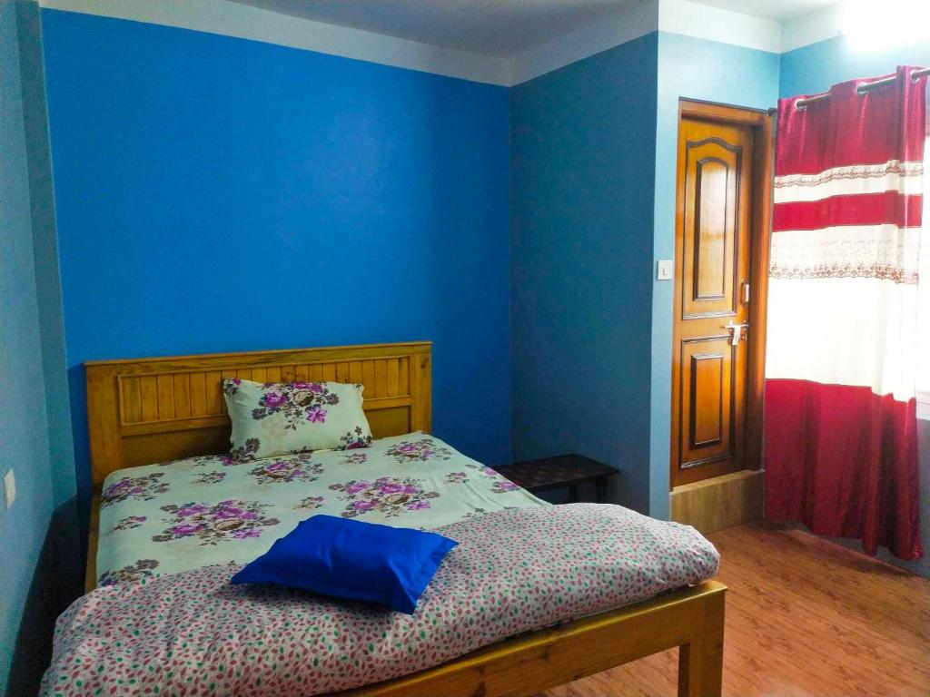 Postel nebo postele na pokoji v ubytování Peace Homestay