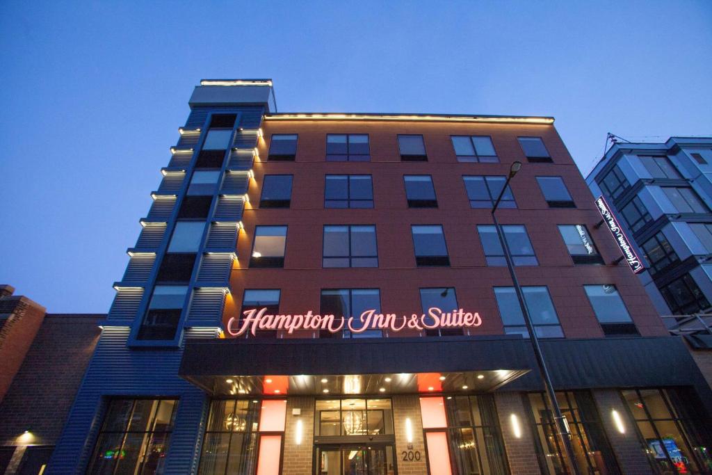 a building with a sign that reads harrington inn and suites at Hampton Inn & Suites St. Paul Downtown in Saint Paul