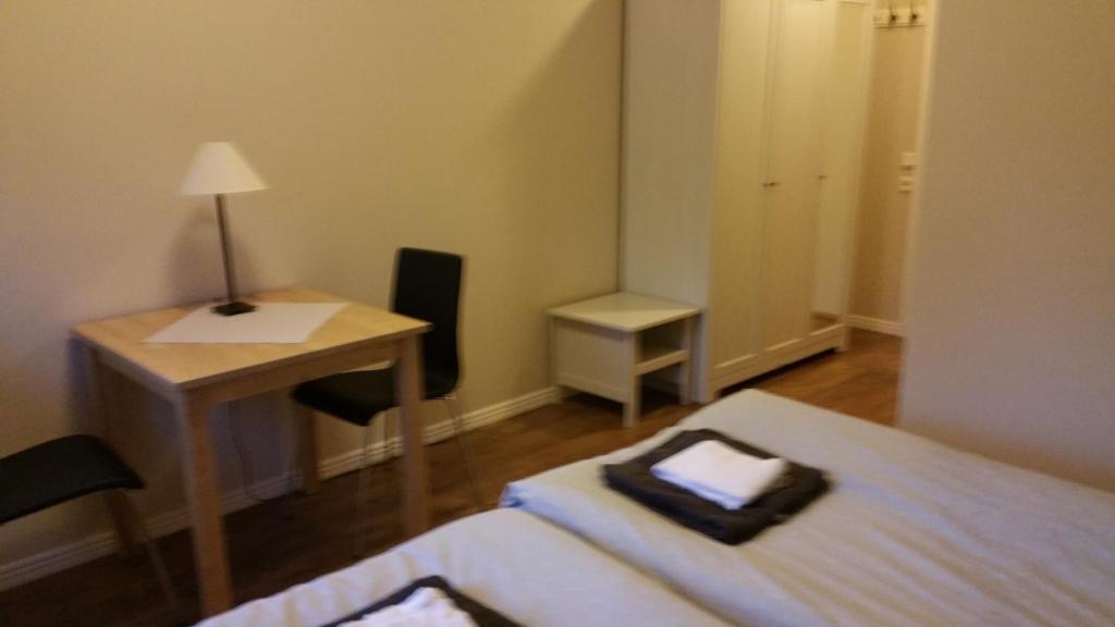 Postel nebo postele na pokoji v ubytování Hotel Dalhem