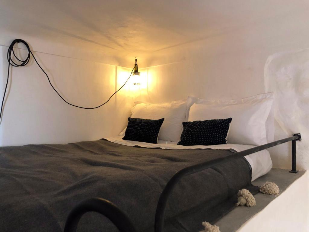 Postel nebo postele na pokoji v ubytování Dar Oki
