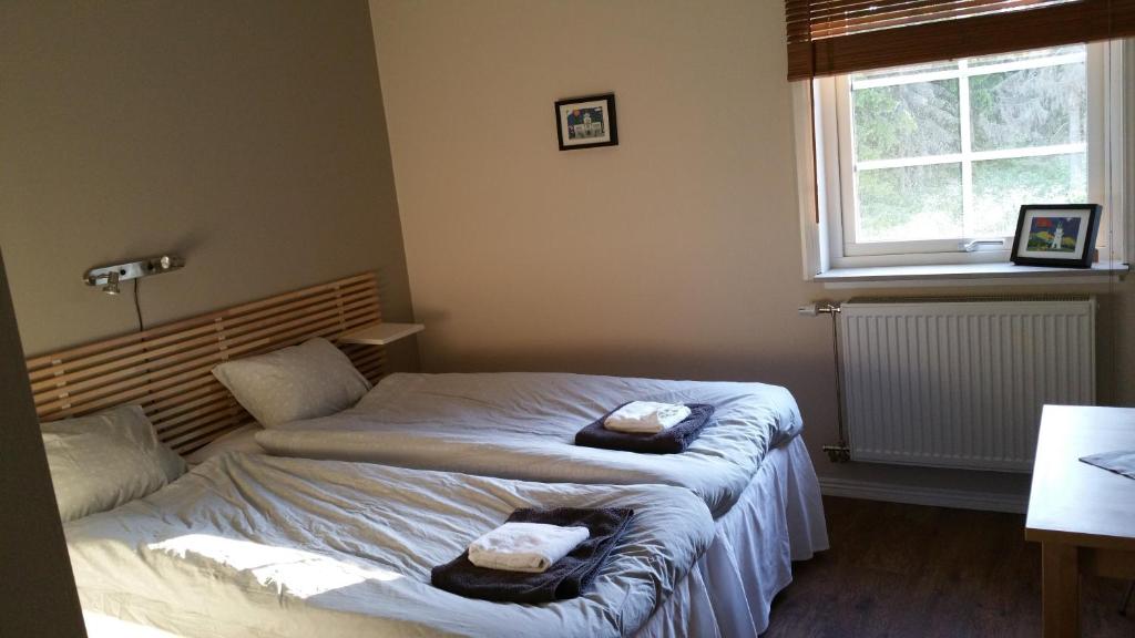 Postel nebo postele na pokoji v ubytování Hotel Dalhem