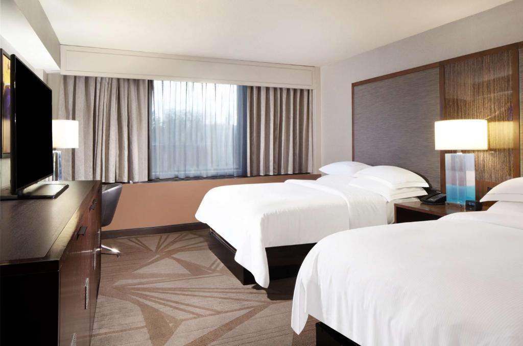 Postel nebo postele na pokoji v ubytování Hilton Parsippany