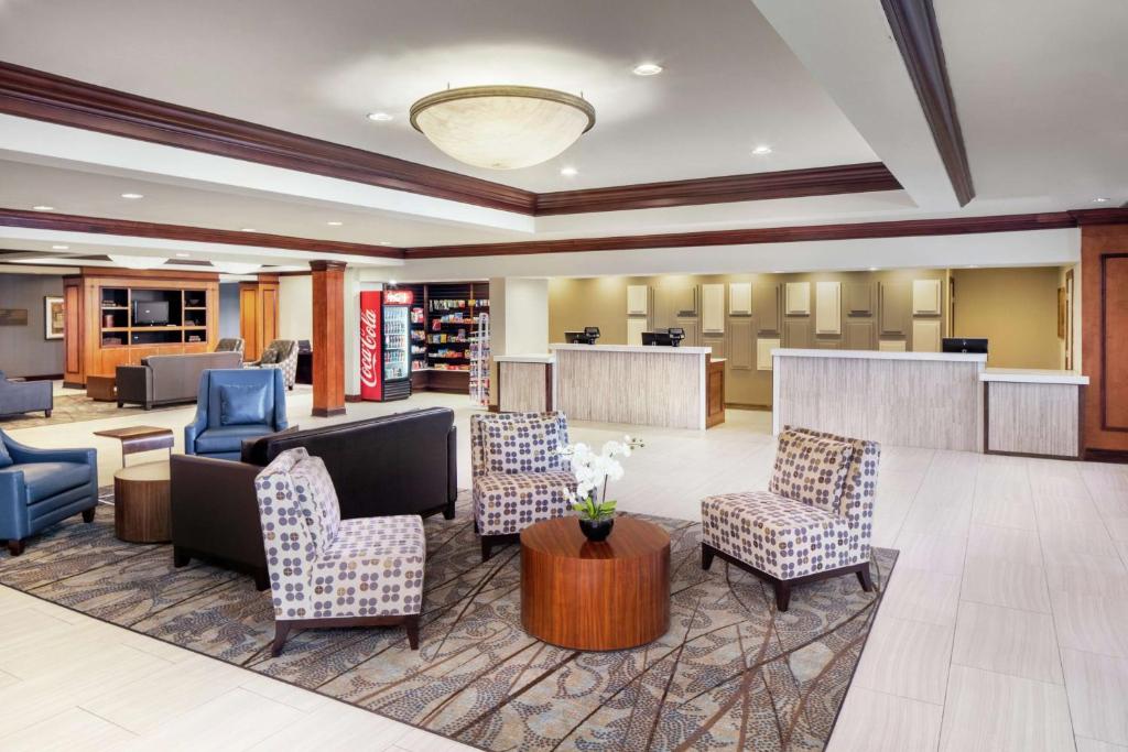 a lobby with chairs and a waiting room at DoubleTree by Hilton Hotel Cleveland - Independence in Independence