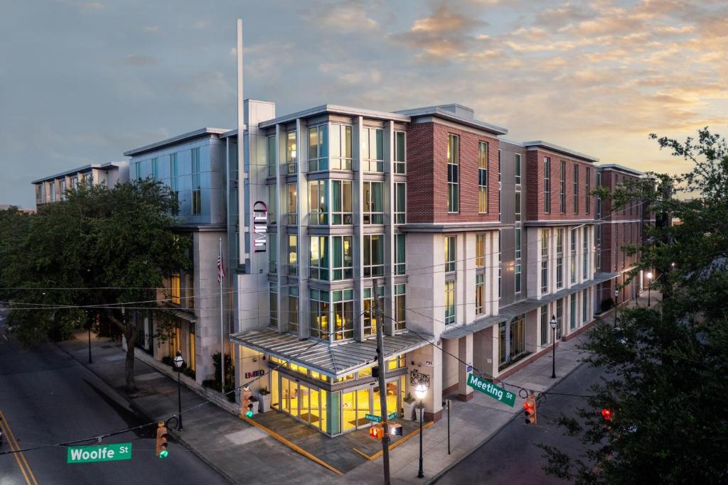 a rendering of a building on a city street at The Limited Hotel in Charleston