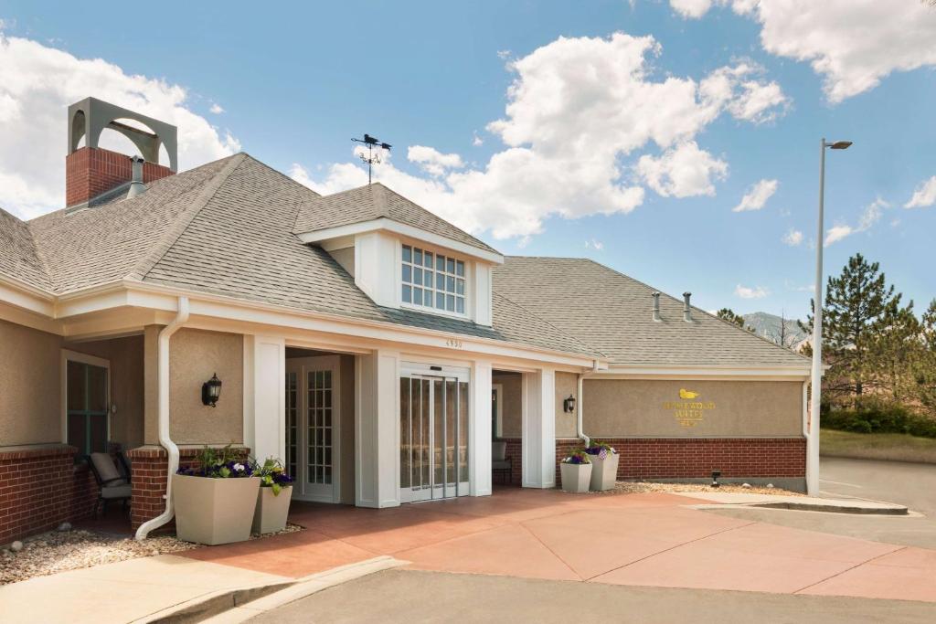 a house with a roof at Homewood Suites by Hilton Boulder in Boulder