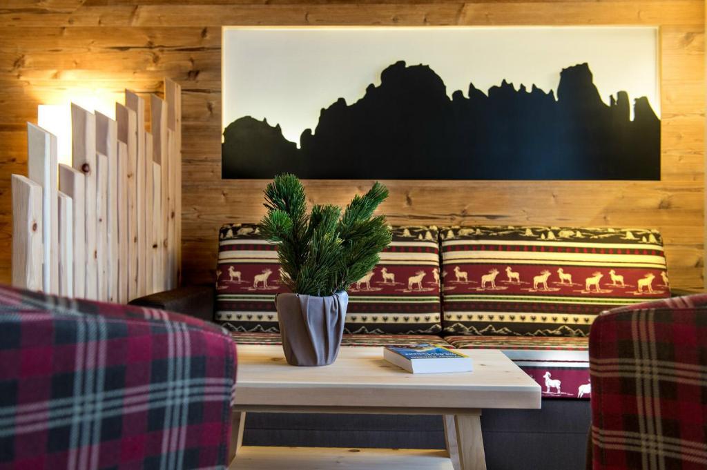 Posezení v ubytování Hotel Chalet Dolomites
