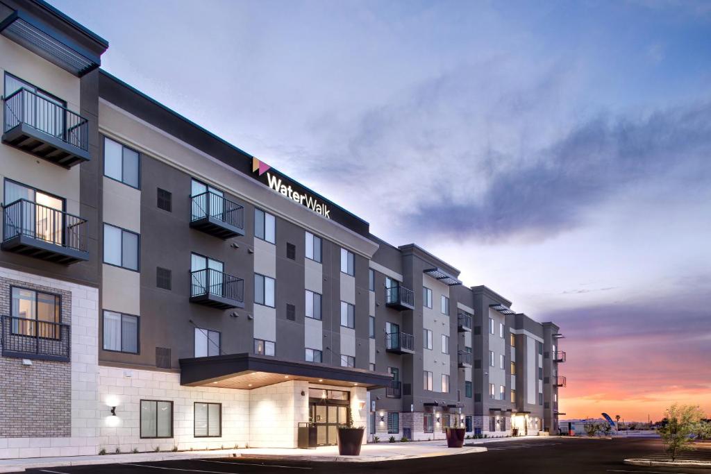 a rendering of a hotel at dusk at WaterWalk Tucson in Tucson