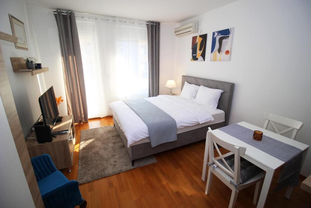 Postel nebo postele na pokoji v ubytování Bizmark accommodation A blok