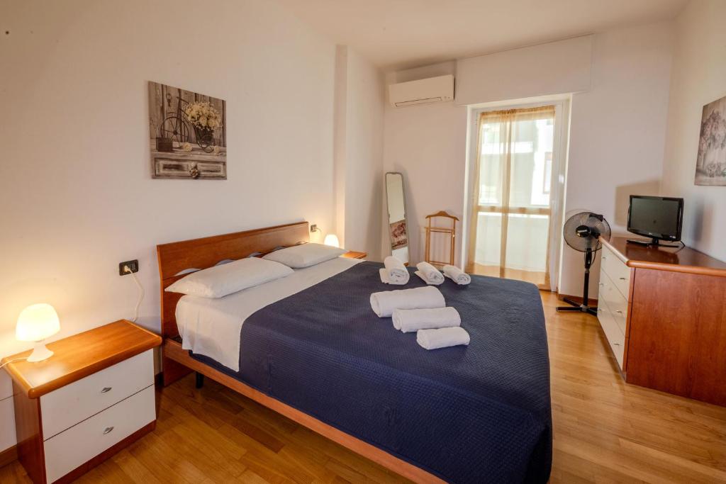 Postel nebo postele na pokoji v ubytování Isa Center - Leonardo Accademy - MXP - Lakes