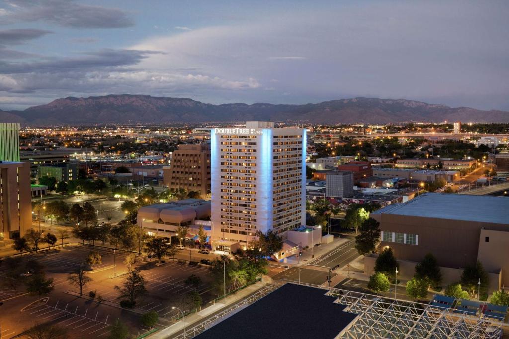 a view of a city with a tall building at DoubleTree by Hilton Hotel Albuquerque in Albuquerque