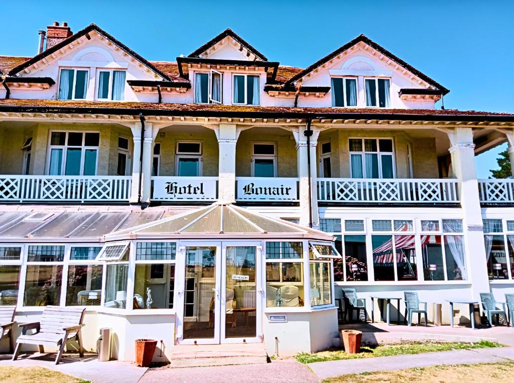 a large building with the words grand hotel at Bonair Hotel in Paignton