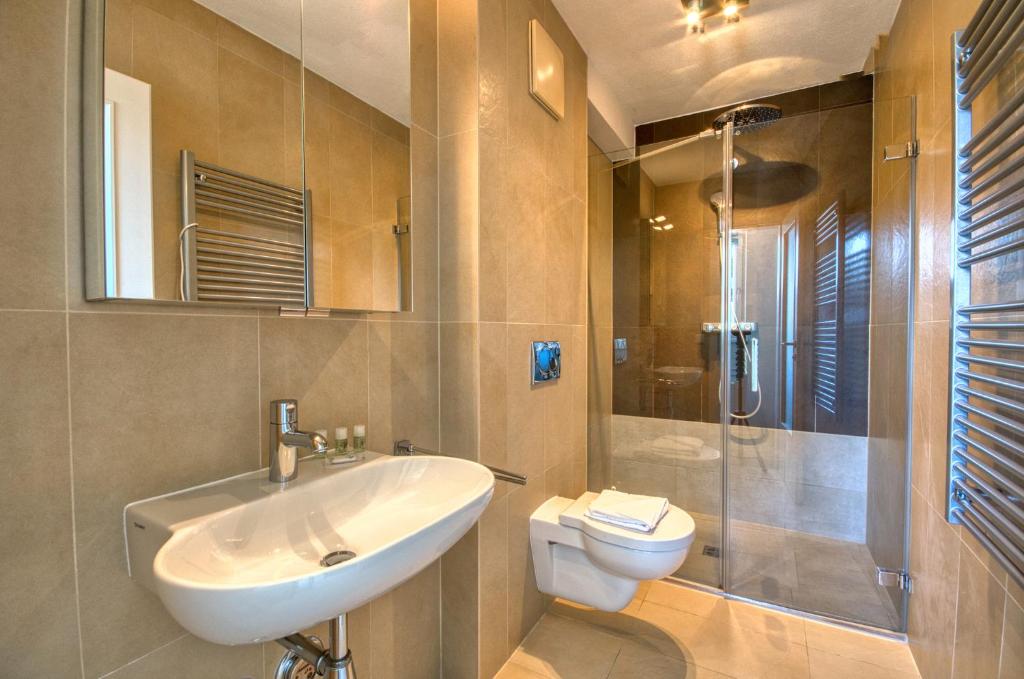 A bathroom at Apartment Leon - by Alpen Apartments