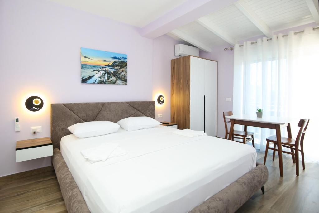 Voodi või voodid majutusasutuse Queen Apartmets Vlore toas