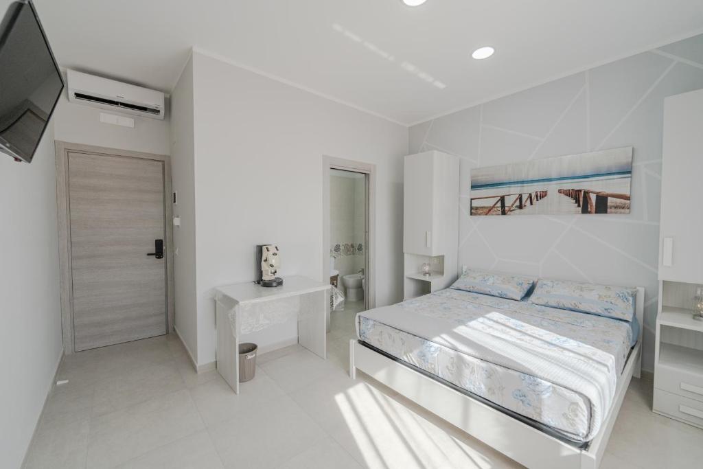 Postel nebo postele na pokoji v ubytování Lullaby B&B