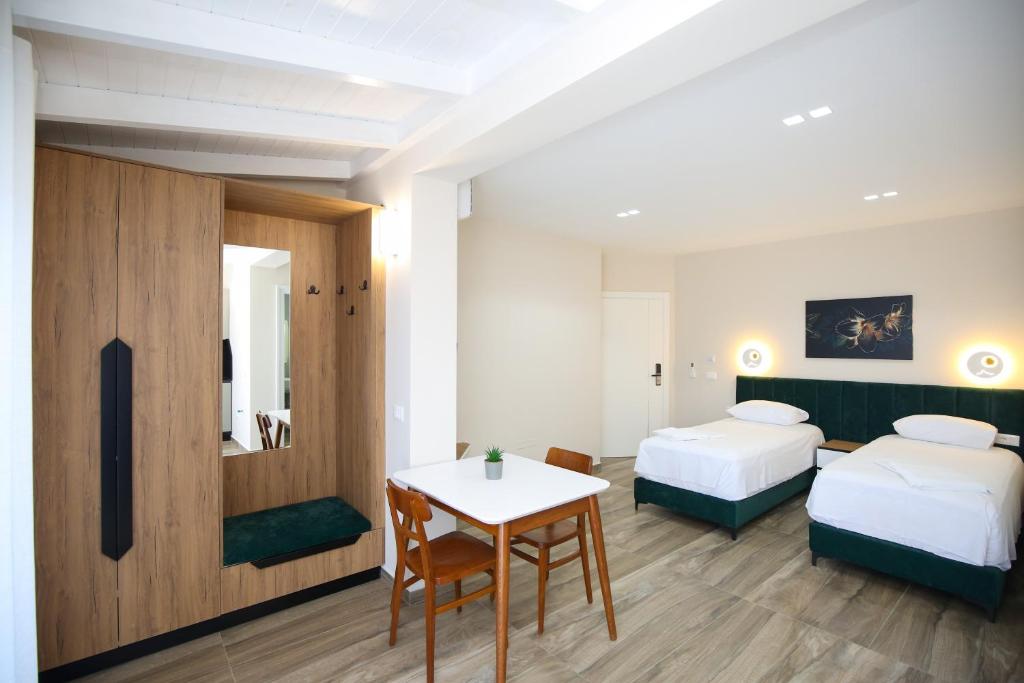 Voodi või voodid majutusasutuse Queen Apartmets Vlore toas