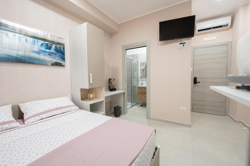 Postel nebo postele na pokoji v ubytování Lullaby B&B