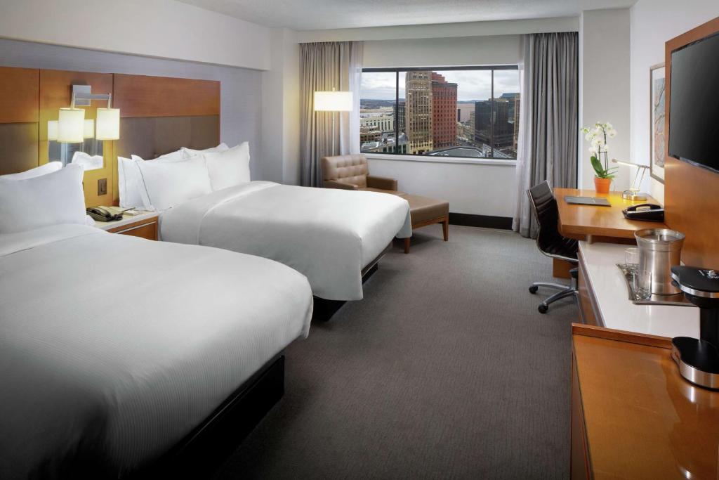 Postel nebo postele na pokoji v ubytování Hilton Albany