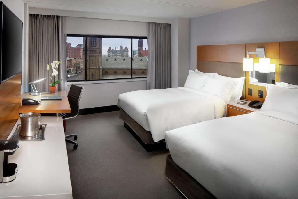 Postel nebo postele na pokoji v ubytování Hilton Albany