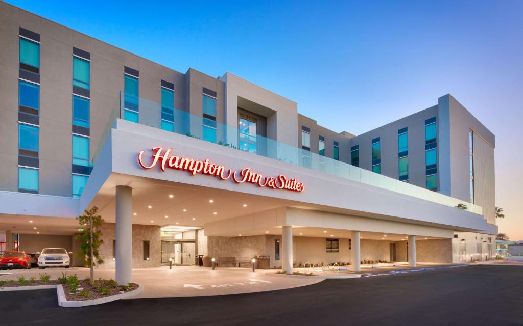 a hospital building with a sign that reads hamlin your service at Hampton Inn & Suites Anaheim Resort Convention Center in Anaheim