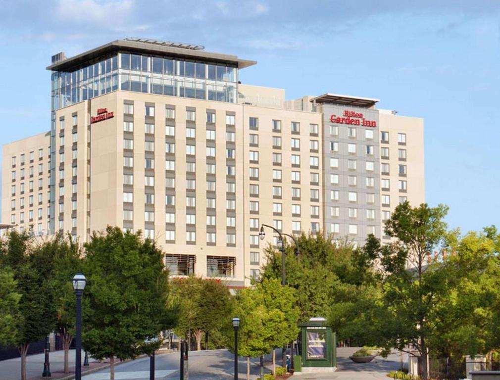 a large white building with a lot of windows at Hilton Garden Inn Atlanta Downtown in Atlanta