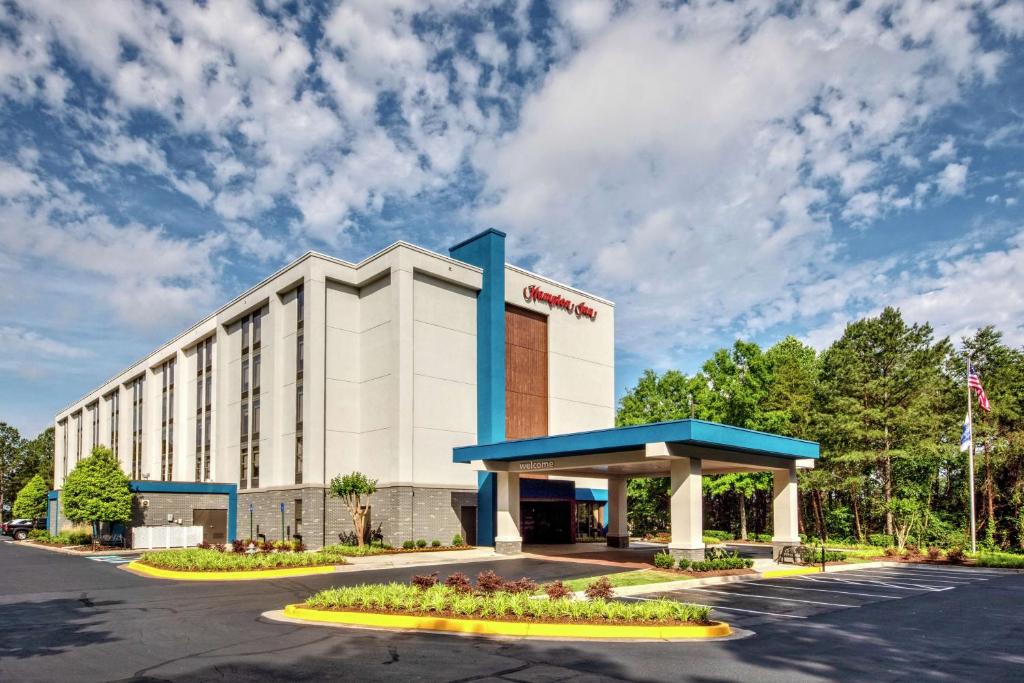 a rendering of the front of a hotel at Hampton Inn Atlanta-Peachtree Corners/Norcross in Norcross