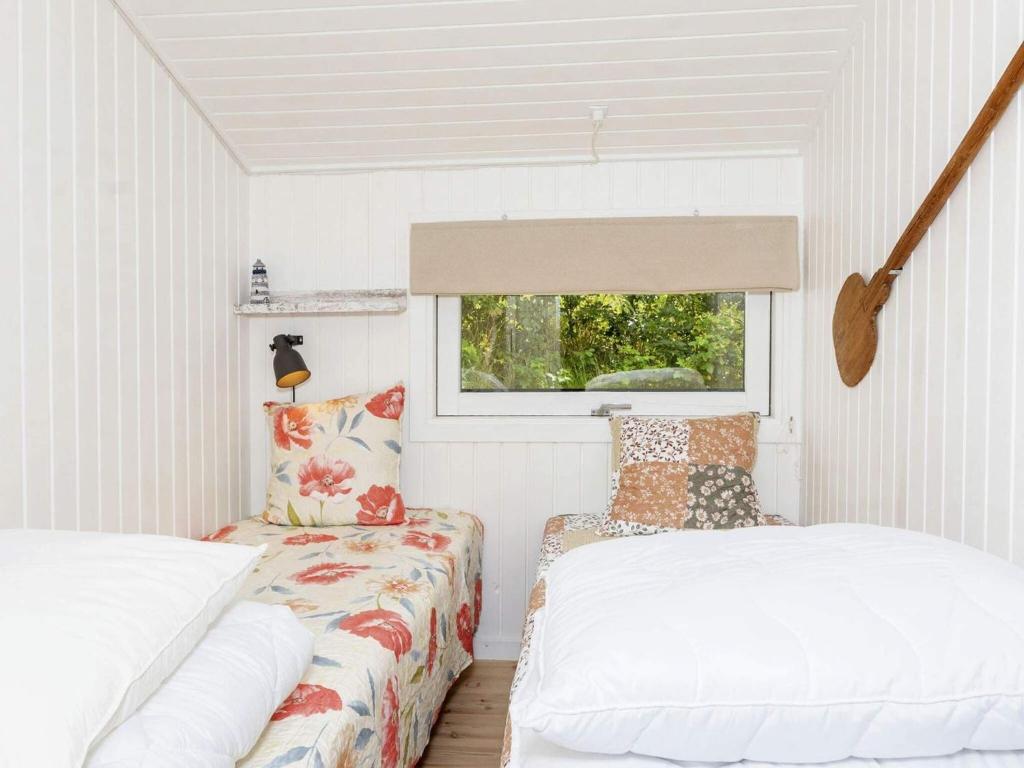 Postel nebo postele na pokoji v ubytování Holiday home Fjerritslev IX