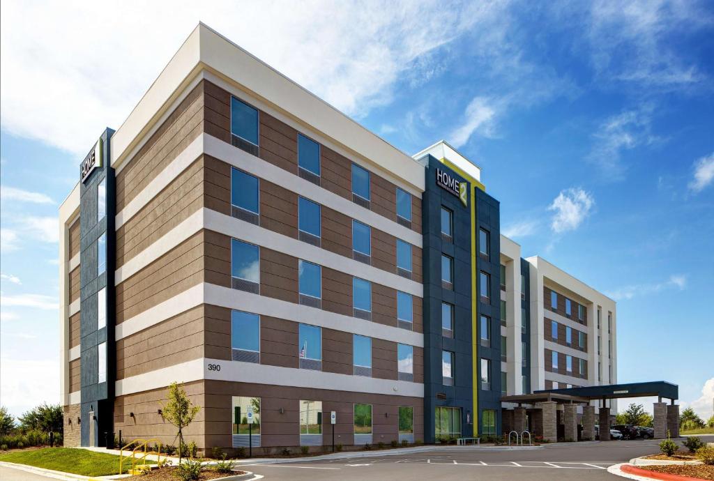 a rendering of a hotel planned for the parking lot at Home2 Suites By Hilton Asheville Airport in Arden