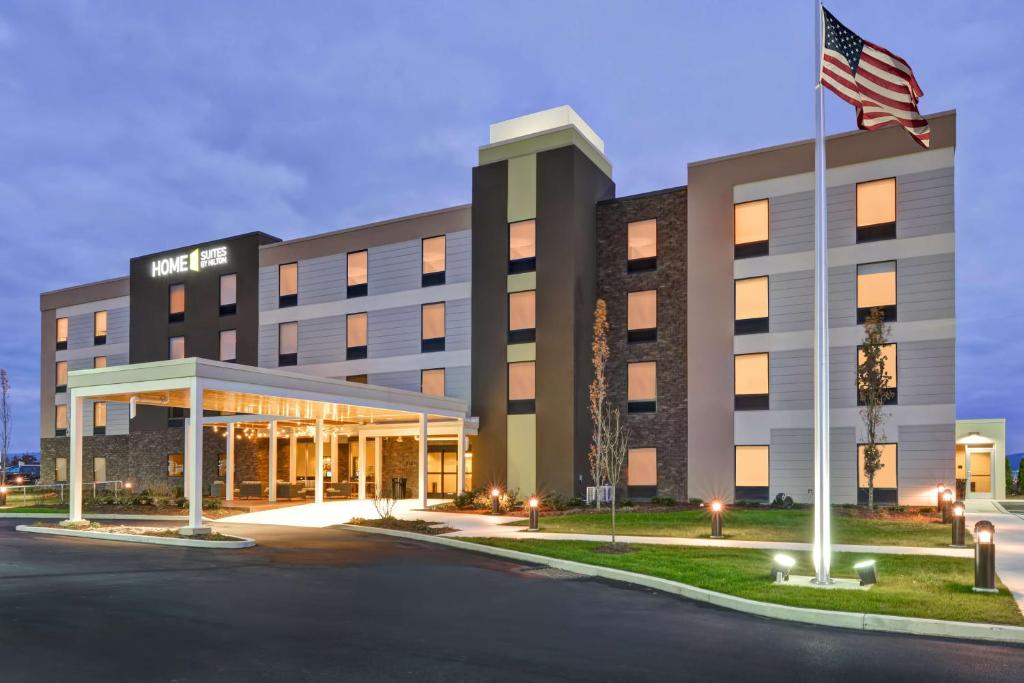 a hotel with an american flag in front of it at Home2 Suites By Hilton Dickson City Scranton in Dickson City