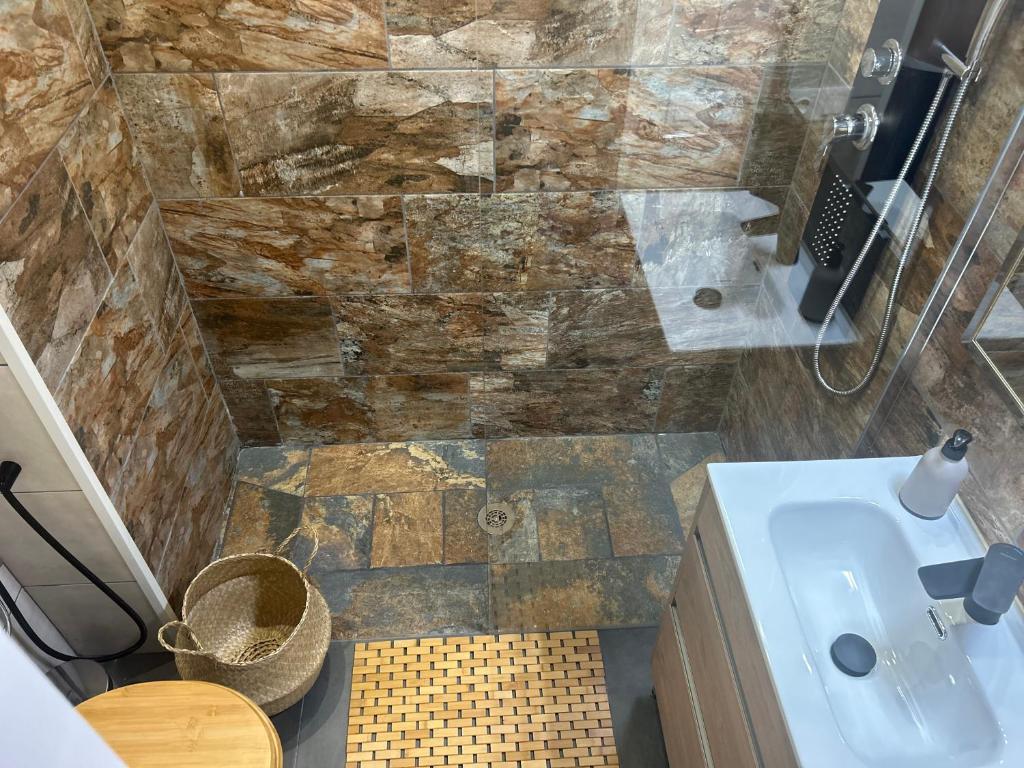 a bathroom with a sink and a shower at Estrella marina home (suite) in Costa de Antigua