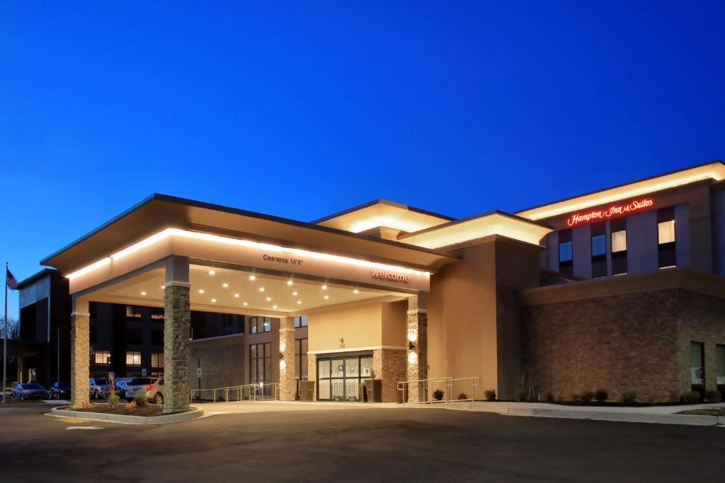a hospital building with lights in a parking lot at Hampton Inn & Suites By Hilton Baltimore/Aberdeen, Md in Aberdeen