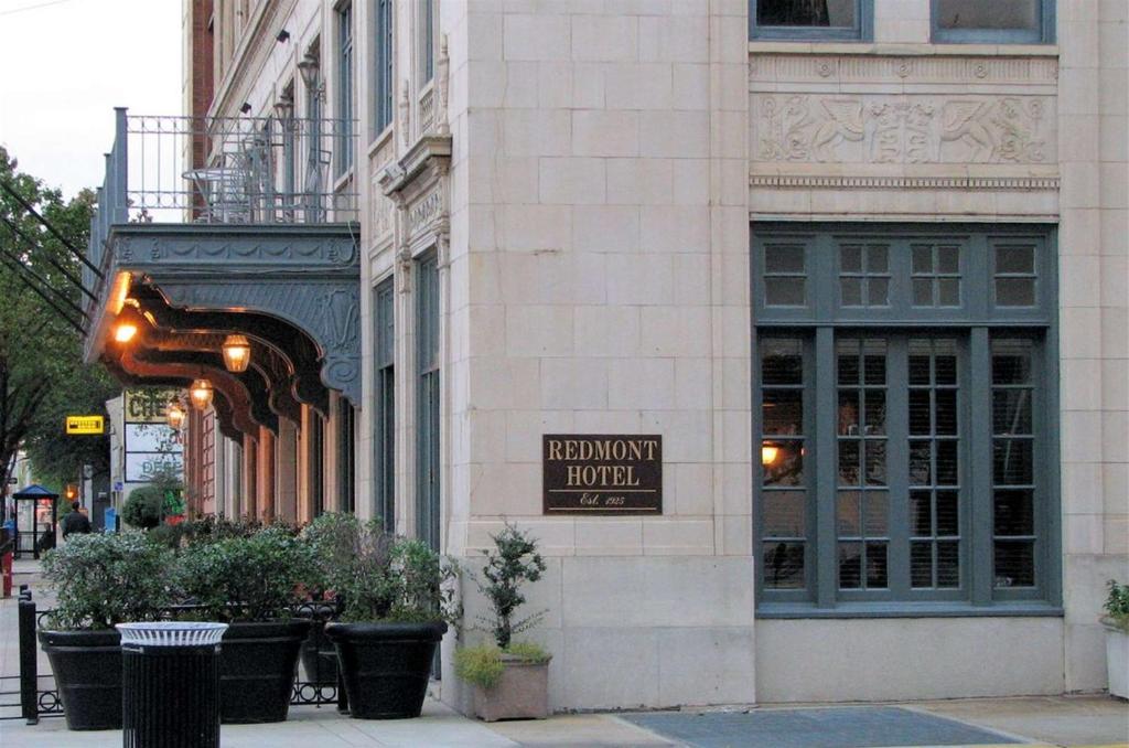 a building with a sign on the side of it at Redmont Hotel Birmingham - Curio Collection by Hilton in Birmingham