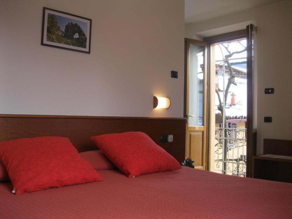 Postel nebo postele na pokoji v ubytování Albergo Esposito