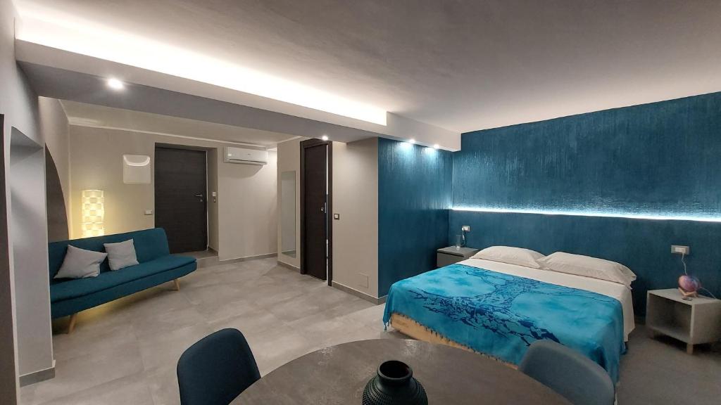 Postel nebo postele na pokoji v ubytování I 3 Principi, Garibaldi Suites