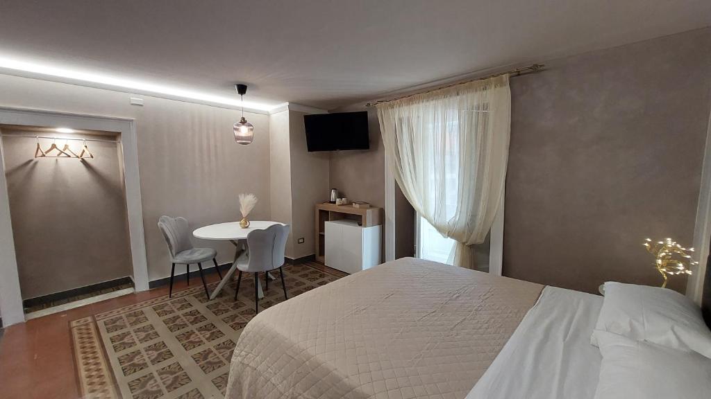 Postel nebo postele na pokoji v ubytování I 3 Principi, Garibaldi Suites
