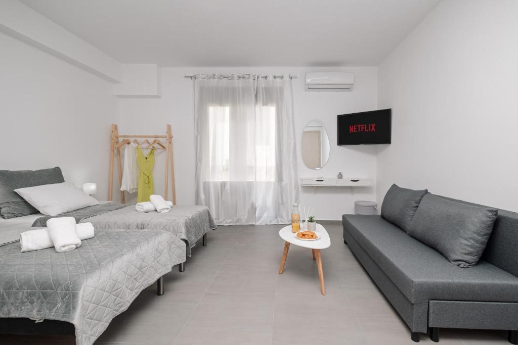 Postel nebo postele na pokoji v ubytování 777 Studios Corfu